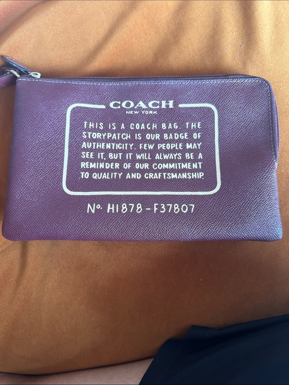 Coach Plum Leather Zip Pouch with Signature Storypatch
